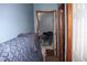 Modest bedroom with neutral walls, showing space to customize and make your own at 14057 Ithaca Way, Orlando, FL 32826