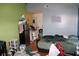 Bedroom featuring bed, dresser, and natural light at 14057 Ithaca Way, Orlando, FL 32826