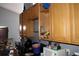Kitchen with wood cabinets and countertops, displaying a cooking range and visible cabinet contents at 14057 Ithaca Way, Orlando, FL 32826
