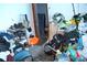An untidy room in need of cleaning and organization, filled with personal belongings and assorted items at 14057 Ithaca Way, Orlando, FL 32826