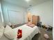 Charming bedroom with carpet floors and abundant closet space for storage at 1412 Brentwood Dr, Kissimmee, FL 34746
