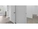 Hallway with tile floors connecting to other rooms at 1412 Brentwood Dr, Kissimmee, FL 34746
