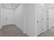 Hallway with tile flooring leading to other rooms at 1412 Brentwood Dr, Kissimmee, FL 34746
