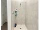 Spacious stand-up shower with light-colored tile at 1412 Brentwood Dr, Kissimmee, FL 34746