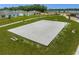 Aerial view of a community sand volleyball court surrounded by green grass at 1412 Brentwood Dr, Kissimmee, FL 34746