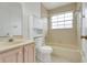 Bathroom with tub and shower combination and a single sink vanity at 1517 Abberton Dr, Orlando, FL 32837