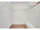 Walk-in closet with wire shelving and a built-in bench at 1517 Abberton Dr, Orlando, FL 32837