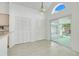 Bright dining area with sliding door, tile flooring, and large windows at 1517 Abberton Dr, Orlando, FL 32837