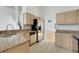 Bright kitchen with granite countertops, stainless steel refrigerator, and tile flooring at 1517 Abberton Dr, Orlando, FL 32837