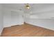 Bright living room featuring wood laminate floors and a ceiling fan at 1517 Abberton Dr, Orlando, FL 32837