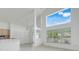 Bright living room with large windows, tile flooring, and neutral walls at 1517 Abberton Dr, Orlando, FL 32837
