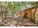 Large backyard view featuring covered porch and patio with outdoor seating at 1860 Ne 62Nd St, Ocala, FL 34479