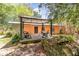 Backyard deck featuring outdoor seating and a covered pergola at 1860 Ne 62Nd St, Ocala, FL 34479