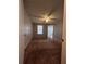 Cozy bedroom with neutral carpet and ample natural light from the window, creating a relaxing space at 2202 Key West Ct # 633, Kissimmee, FL 34741