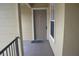 Condo entrance with neutral door and cream colored walls at 2202 Key West Ct # 633, Kissimmee, FL 34741