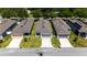 An aerial view of several single-Gathering homes with well-maintained lawns and two-car garages at 2340 Grasmere View S Pkwy, Kissimmee, FL 34746