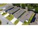 An aerial view of single-Gathering homes with two-car garages and pristine lawns at 2340 Grasmere View S Pkwy, Kissimmee, FL 34746