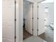 Interior hallway offers access to bedrooms and other living spaces in the home at 2340 Grasmere View S Pkwy, Kissimmee, FL 34746