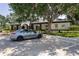 Parking lot in front of building with a car parked in a designated space at 2340 Grasmere View S Pkwy, Kissimmee, FL 34746