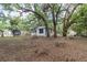 Traditional home exterior with large, tree-filled yard at 2504 Yale Ave, Sanford, FL 32773
