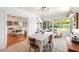 Cozy breakfast nook with tiled floor, bright windows, and adjacent living room at 2707 Chelsea St, Orlando, FL 32803