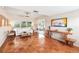 Inviting living room with parquet floors, neutral walls, large windows, and stylish decor at 2707 Chelsea St, Orlando, FL 32803