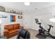 Well-lit bedroom featuring workout equipment, comfortable seating, and ample closet space at 2934 Title St, Kissimmee, FL 34746