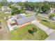 Aerial shot of the home and property, featuring a pool and carport at 2945 Juniper Dr, Edgewater, FL 32141