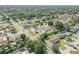 An aerial view of a residential neighborhood featuring well-maintained homes and lush greenery in a tranquil setting at 2945 Juniper Dr, Edgewater, FL 32141
