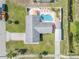 Bird's eye view of the house, pool, and surrounding grassy yard at 2945 Juniper Dr, Edgewater, FL 32141