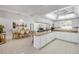 Bright and spacious kitchen with a center island, dining area, and recessed lighting at 2945 Juniper Dr, Edgewater, FL 32141