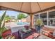 Beautiful view of the backyard pool and patio area from the covered patio at 2945 Juniper Dr, Edgewater, FL 32141