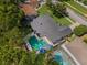 This home features a sparkling private pool, mature trees, and a well-maintained yard in a desirable neighborhood at 3015 Dawley Ave, Orlando, FL 32806