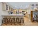 Bright kitchen featuring a spacious island with seating, stainless steel appliances, and ample cabinetry at 3015 Dawley Ave, Orlando, FL 32806