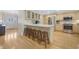 Kitchen with island seating, stainless appliances, and plenty of cabinet space at 3015 Dawley Ave, Orlando, FL 32806