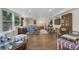 Spacious living room with ample seating, natural light, and a cozy atmosphere at 3015 Dawley Ave, Orlando, FL 32806