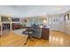 Bright living room featuring hardwood floors, neutral colors, and plenty of natural light at 3015 Dawley Ave, Orlando, FL 32806