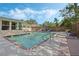 Beautiful in-ground pool with brick trim, concrete area, and lounge chairs providing a relaxing backyard escape at 3015 Dawley Ave, Orlando, FL 32806