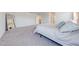 Spacious bedroom with neutral carpet and a large mirror at 3312 Cordgrass Pl, St Cloud, FL 34773