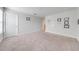 Well-lit room with neutral carpet, featuring picture frame molding and a closet at 3312 Cordgrass Pl, St Cloud, FL 34773