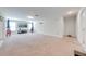 Large game room with carpet, ready for entertainment, and lots of natural light at 3312 Cordgrass Pl, St Cloud, FL 34773