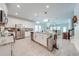 Spacious kitchen boasts stainless steel appliances, granite countertops, and bright open layout at 3312 Cordgrass Pl, St Cloud, FL 34773