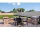 This outdoor patio features a dining set, offering a perfect space for relaxation at 3529 Yarian Dr, Haines City, FL 33844