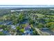 Scenic aerial view highlighting the property's location with tree coverage, offering a glimpse of the surrounding neighborhood at 3608 Dubsdread Cir, Orlando, FL 32804