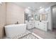 Luxurious bathroom featuring a modern tub, dual vanities, and contemporary design at 3608 Dubsdread Cir, Orlando, FL 32804