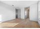This is a bedroom with hardwood floors and multiple doorways at 3608 Dubsdread Cir, Orlando, FL 32804