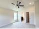 A bedroom that features a modern ceiling fan, recessed lighting, and an attached bathroom at 4278 Sagefield Dr, St Cloud, FL 34773