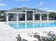 The community pool includes a covered lounge area and comfortable seating for residents at 4278 Sagefield Dr, St Cloud, FL 34773