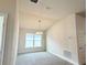 Bright dining area with a modern chandelier and plenty of natural light at 4278 Sagefield Dr, St Cloud, FL 34773