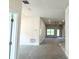 Bright, open-concept living room featuring plush carpet, and recessed lighting at 4278 Sagefield Dr, St Cloud, FL 34773